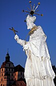 White Christian Statue In Town Square