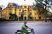 Man On Scooter Driving On Trang Tien Street In Hanoi, Blurred Motion