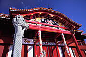 Ornate Building And Statue At Shuri Castle