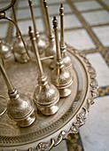 Brass Pipes On Ornate Table, Close Up