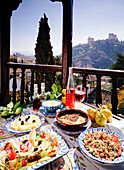 Spanish Food Laid Out On Table On Outdoor Balcony