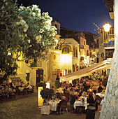 Alfresco Cafes In Town Square At Dusk