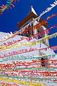 Whitewashed Church And Colorful Streamers