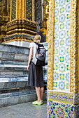 Backpacker At Grand Palace Looking At Walls Of Phra Mondop