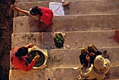 Woman Working On Stairs, Aerial View