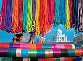 View Through Bead Stall Towards Woman And Taj Mahal