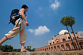 Woman With Backpack Walking Towards Humayun's Tomb