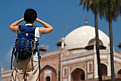 Woman With Backpack Admiring Humayun's Tomb, Rear View