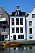Boat On Canal By Houses