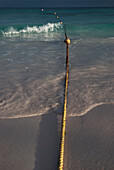 Safety Rope With Buoys Floating In The Ocean; Tulum, Mexico