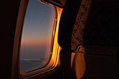 Inside An Airplane With A View Out The Window At Sunset; Mexico