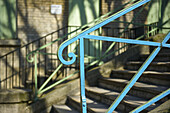 A Blue Painted Metal Railing And Handrail; Paris, France