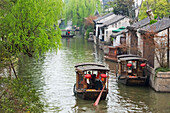 Rowing boat on the Grand Canal, Nanxun Ancient Town, Zhejiang Province, China