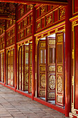 Vietnam, Hue Imperial City. Halls of the Mandarins, red-painted interior