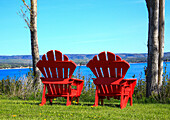 Canada, Nova Scotia, Adirondack chairs near Cabot Trail, Cape Breton