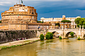Italy, Rome. Tiber River, Castel Sant'Angelo and Ponte Sant'Angelo seen upstream from Ponte Vittorio Emmanuelle II.