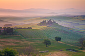 Italy, Tuscany, Val d' Orcia. The Belvedere farmhouse at sunrise