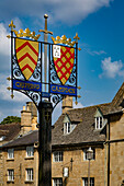 Town Crest sign and buildings of Chipping Campden, Cotswolds, Gloucestershire, England