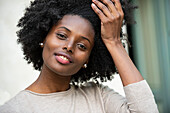 Portrait of smiling young woman in park