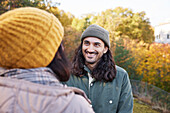 Happy couple in autumn scenery