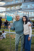 Woman and girl standing together