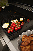 Cherry tomatoes on barbecue