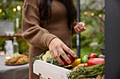 Woman's hand holding vegetable