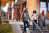 Smiling friends walking together