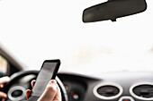 Person using phone while driving