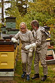 Bee-keepers laughing after work