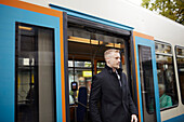 Man leaving bus