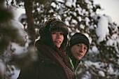 Two teenage boys in winter scenery