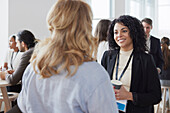 Smiling businesswoman talking