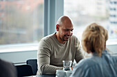 Smiling man during business meeting