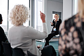 Woman having a presentation during meeting