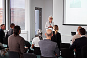 Woman having presentation during business meeting