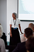 Woman having presentation during business meeting