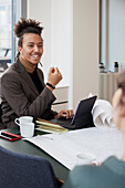 Smiling man in office