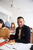 Portrait of smiling man in class