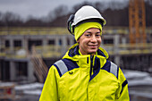 Female engineer at building site