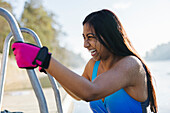 Woman preparing for swim at winter