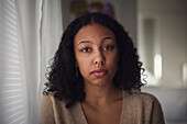 Portrait of pensive young woman