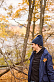 Smiling young man looking away