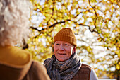 Smiling senior man looking away