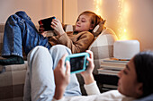 Children playing video games at home