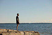 View of man standing at sea