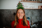 Portrait of smiling girl with Christmas headband