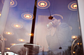 Elegant man drinking coffee in cafe