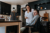 Mother with daughter in kitchen