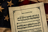 Vintage musical score Youre a Grand Old Flag and American flag 